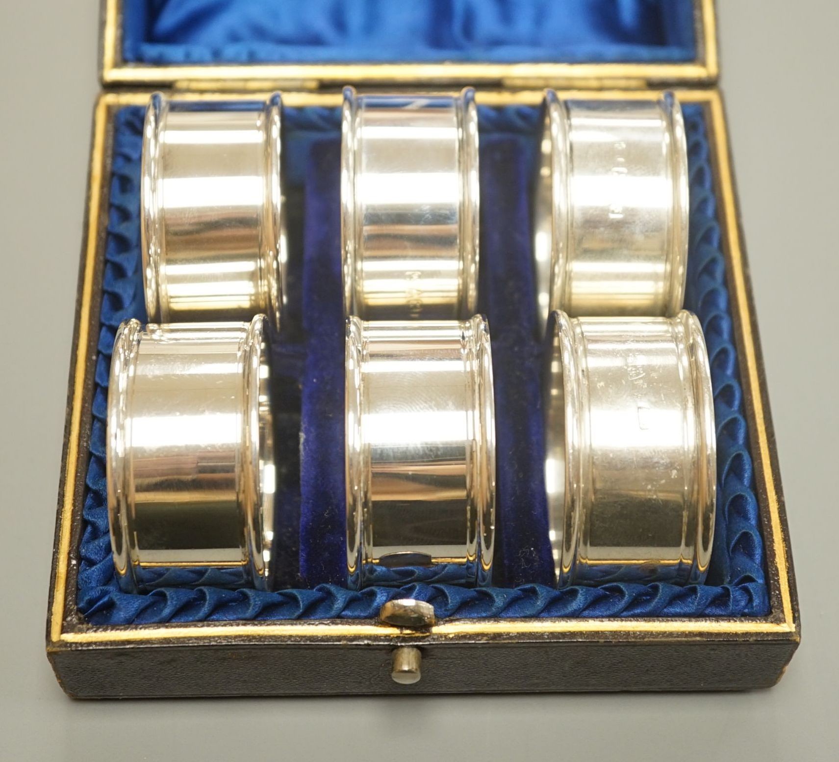 A cased matched set of six early 20th century plain silver napkin rings, by Charles Horner, Chester, various dates.